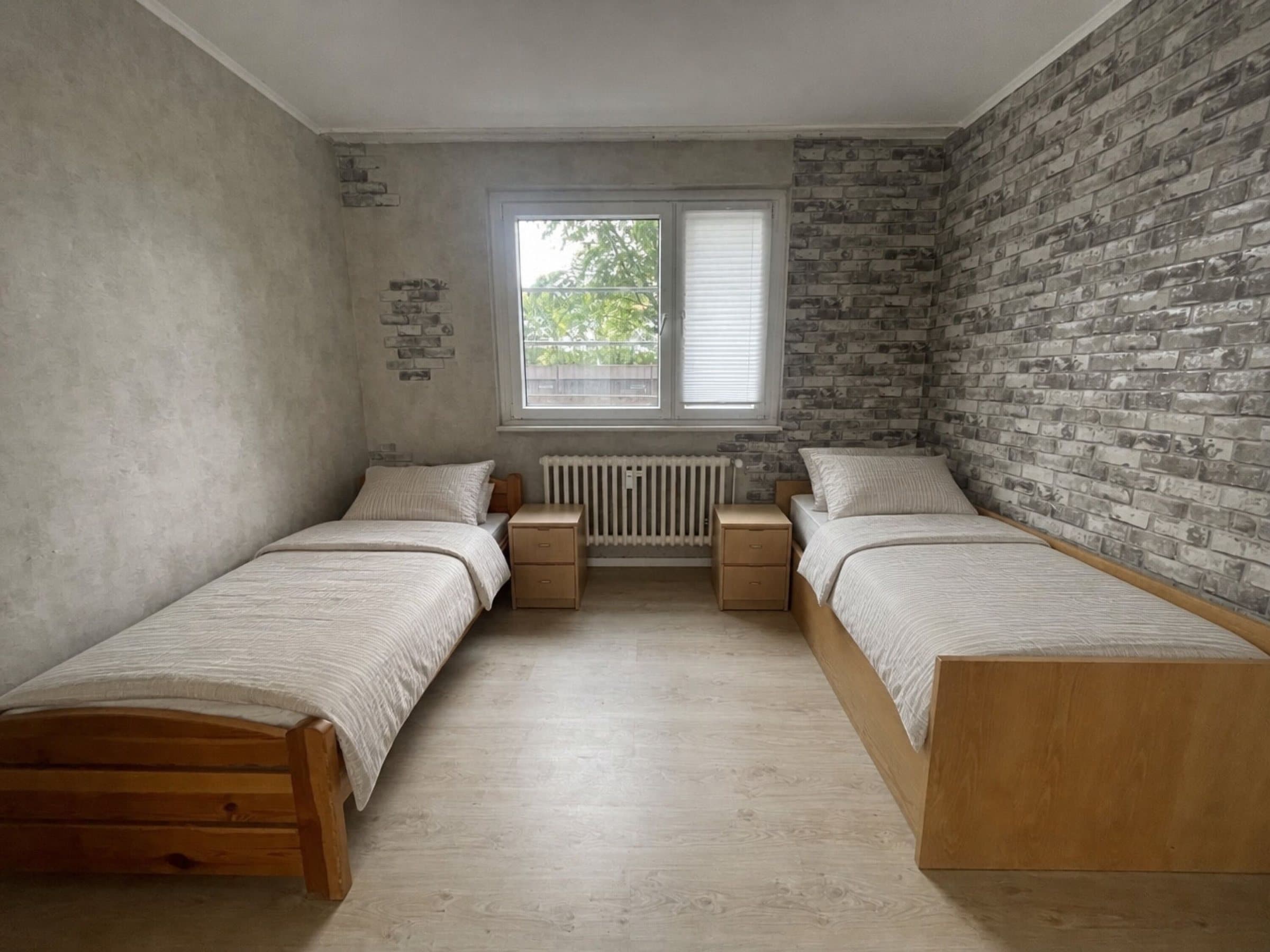 Schlafzimmer mit zwei Einzelbetten